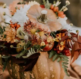 Thanksgiving centerpiece workshop arrangement with seasonal flowers, greenery, and autumn colors at 2 Wild Poppies.